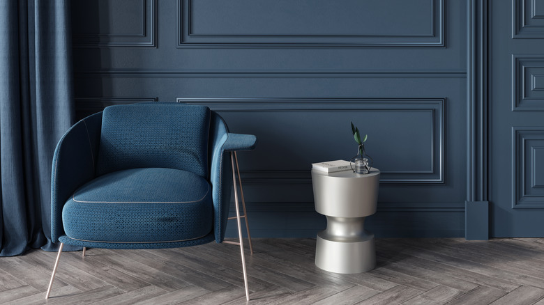 tường phòng khách đúc màu xanh