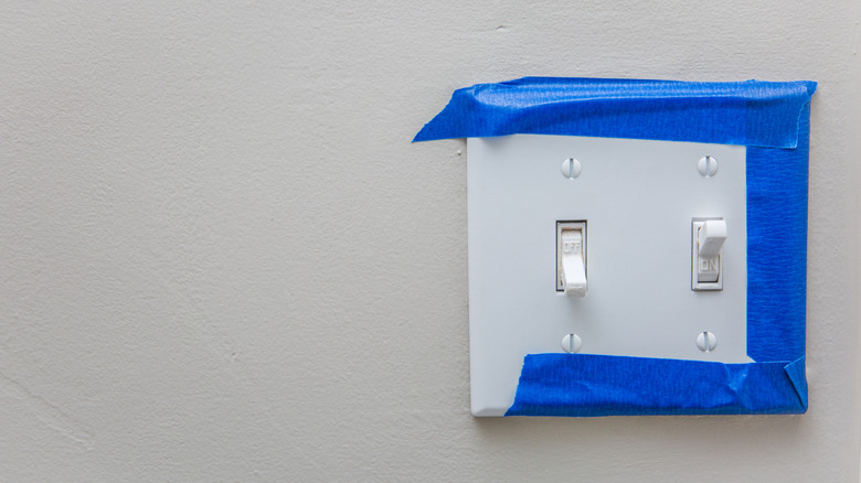 băng họa sĩ trên công tắc đèn